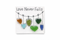 “Love Never Fails” Sea Glass Heart Magnet